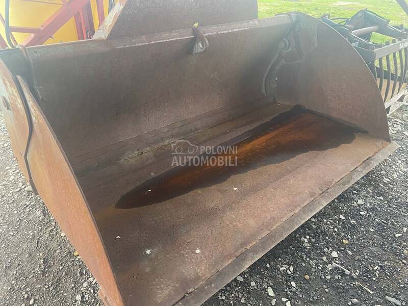 New Holland Kasika krokodilka