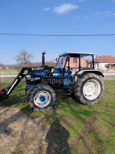 Ford 6610 sa utovarnom granom