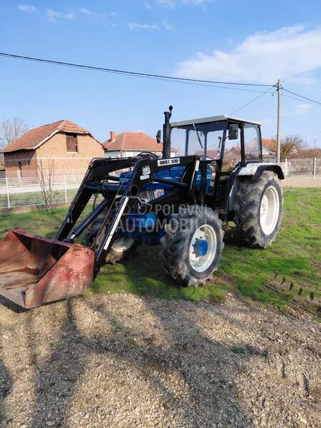 Ford 6610 sa utovarnom granom