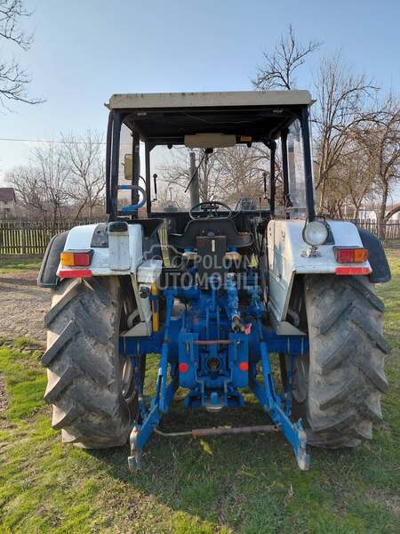 Ford 6610 sa utovarnom granom