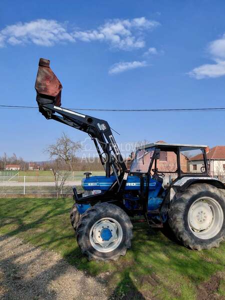 Ford 6610 sa utovarnom granom