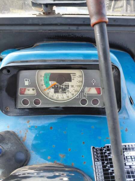 Ford 6610 sa utovarnom granom