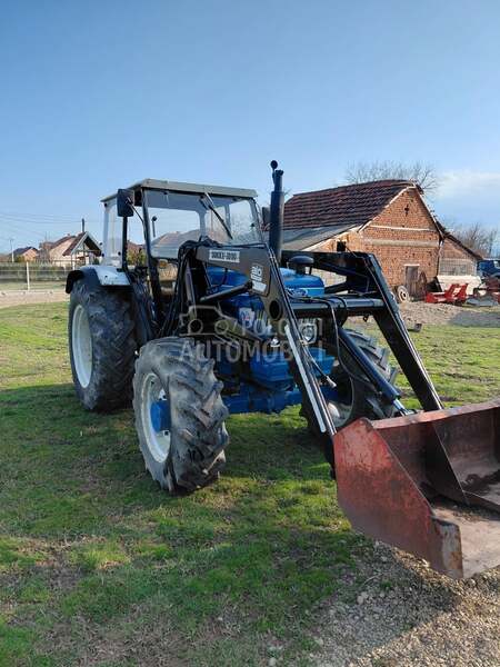 Ford 6610 sa utovarnom granom