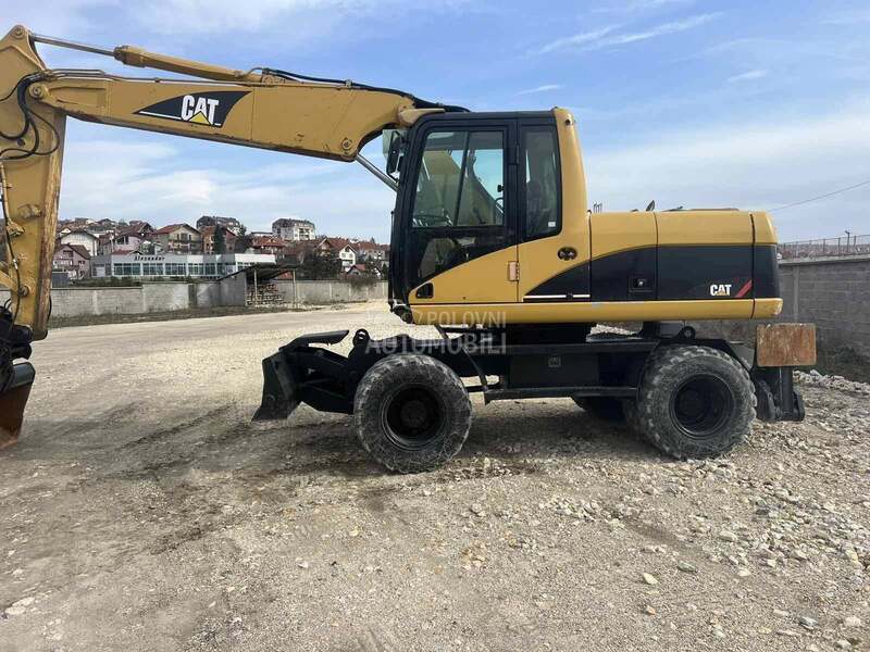 CAT M316C