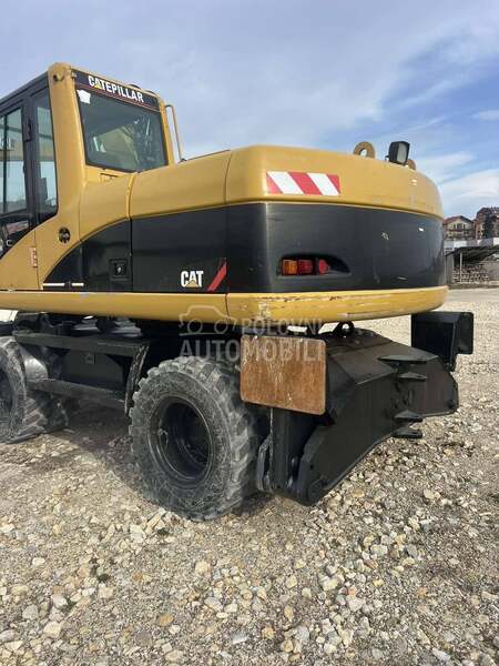 CAT M316C