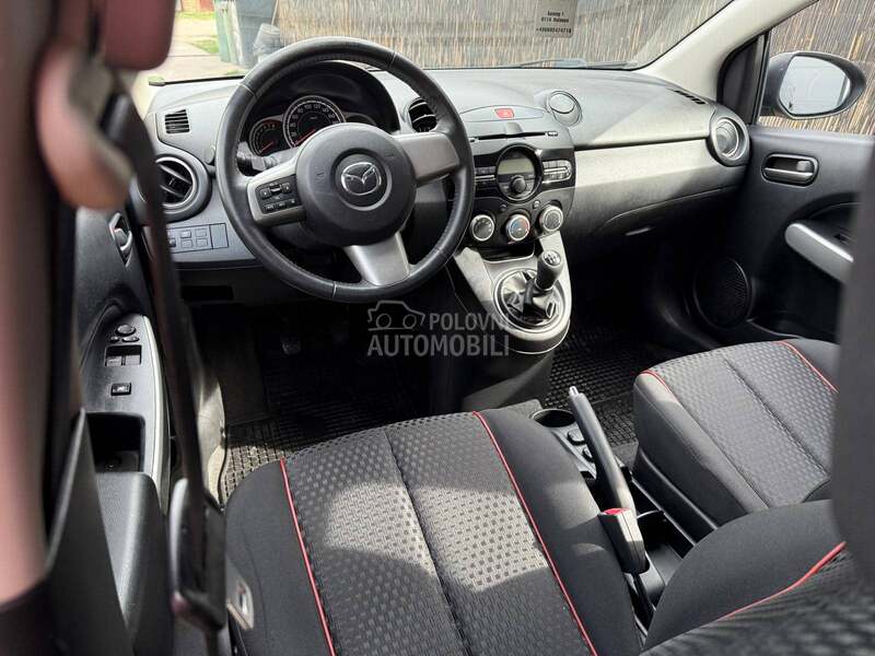 Mazda 2 1 32000 k m