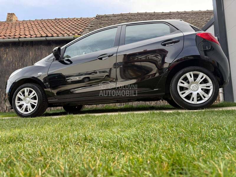 Mazda 2 1 32000 k m