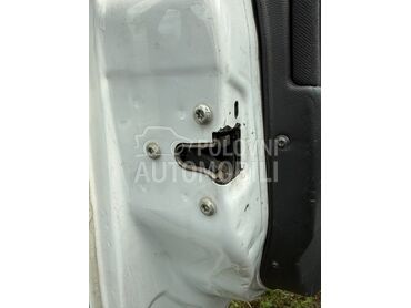 Leva i desna brava pred. vrata za Opel Astra G