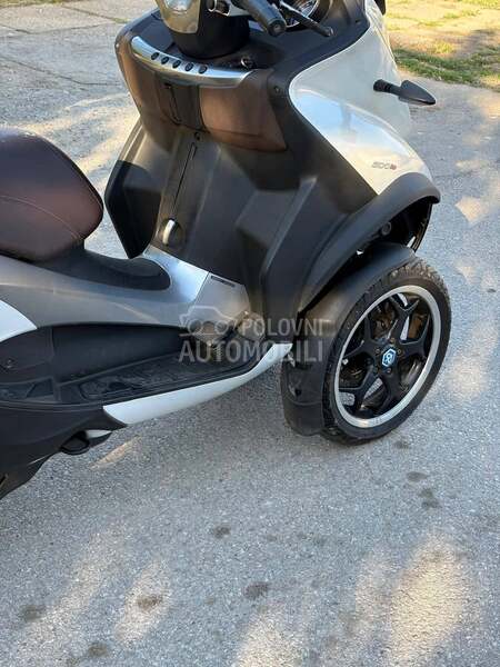 Piaggio Mp3 business